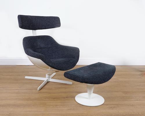 IN THE MANNER OF JEAN MARIE MASSAUD; A CASSINA SWIVAL ARMCHAIR (2)