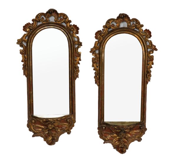 A PAIR OF 19TH CENTURY ITALIAN GILT FRAMED ARCHED WALL MIRRORS (3)