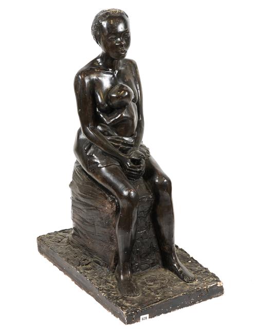 A LARGE PLASTER MODEL OF A MOTHER AND CHILD