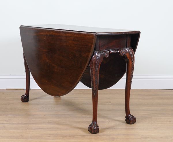 A GEORGE II MAHOGANY OVAL DROP LEAF TABLE