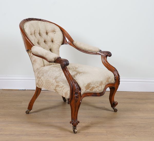 A VICTORIAN ROSEWOOD FRAMED LOW OPEN ARMCHAIR