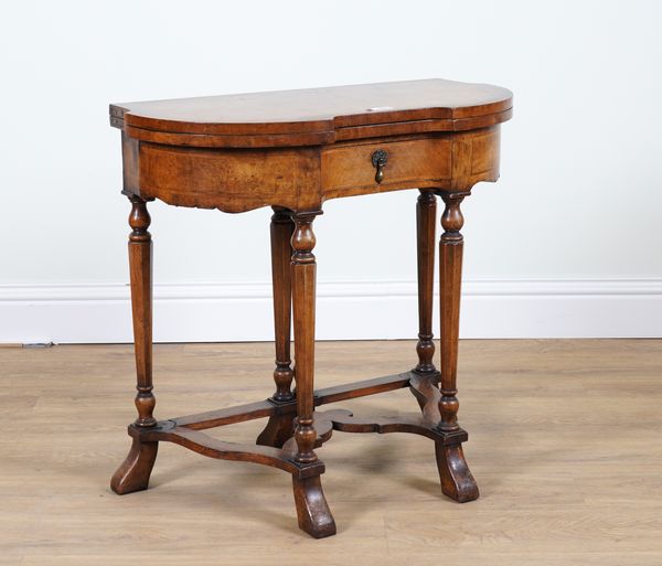 GILL & REIGATE LONDON; A WILLIAM AND MARY STYLE WALNUT TEA TABLE