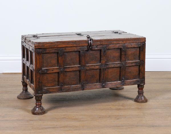 A 19TH CENTURY INDIAN IRON BOUND TEAK LIFT TOP TRUNK