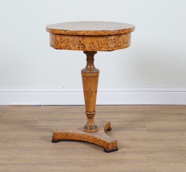 A 19TH CENTURY POLLARD OAK SMALL DRUM TABLE