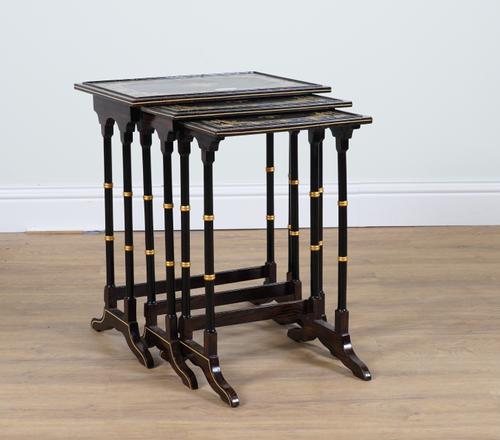 AN ITALIAN FAUX ROSEWOOD PAINTED NEST OF THREE TABLES