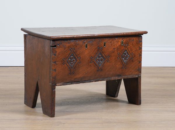 A SMALL 17TH CENTURY AND LATER OAK SIX PLANK COFFER