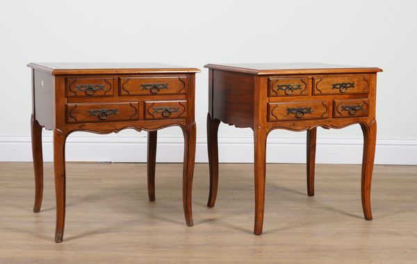 A PAIR OF LOUIS XVI STYLE WALNUT FOUR DRAWER BEDSIDE TABLES (2)