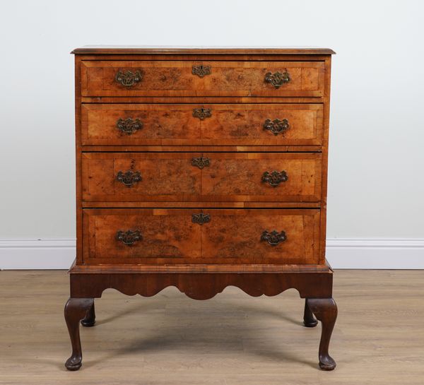 A GEORGE I STYLE FIGURED WALNUT FOUR DRAWER CHEST ON STAND