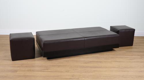 ALMA; A LEATHER UPHOLSTERED RECTANGULAR OTTOMAN (3)