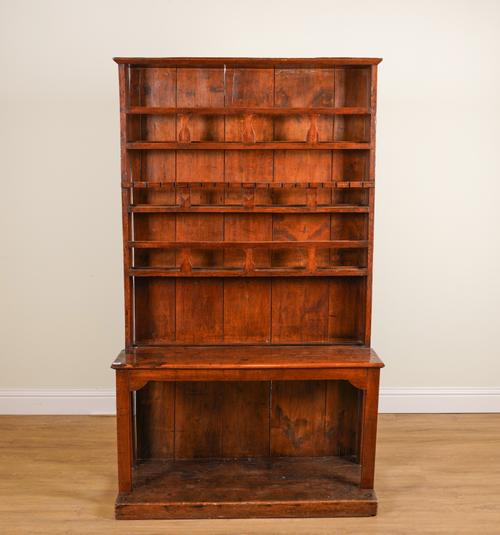 AN EARLY 19TH CENTURY FRENCH PROVINCIAL FRUITWOOD ENCLOSED BACK DRESSER