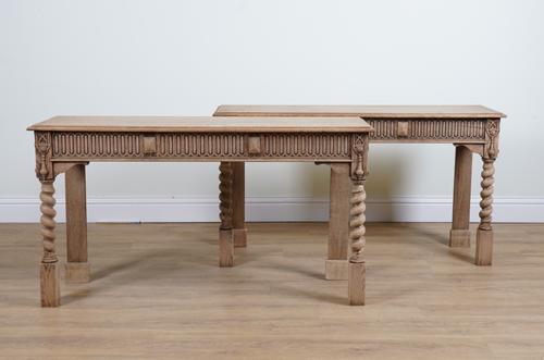 A PAIR OF VICTORIAN AND LATER OAK CONSOLE TABLES (2)