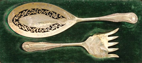 A PAIR OF SILVER GILT SARDINE SERVERS