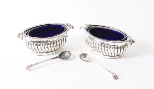 A PAIR OF VICTORIAN SILVER TWIN HANDLED SALTS AND A PAIR OF SILVER SALT SPOONS (4)