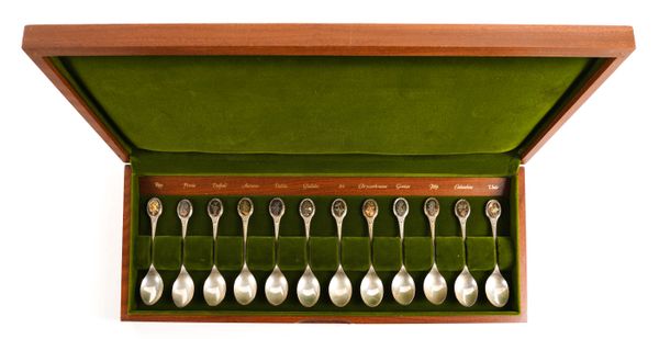 A SET OF TWELVE SILVER SPOONS