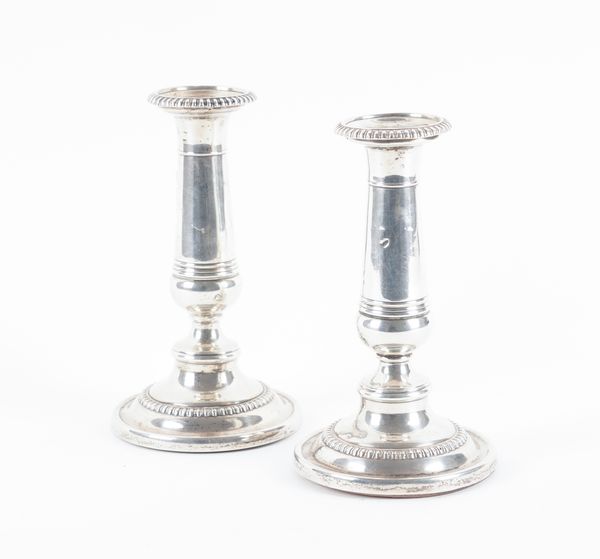 A PAIR OF GEORGE III SILVER TABLE CANDLESTICKS