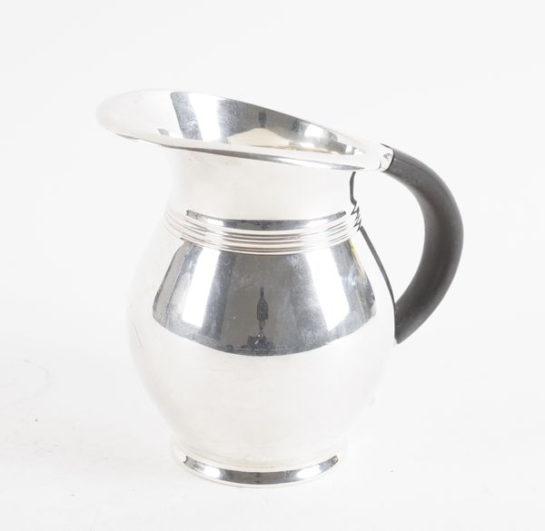 A SILVER WATER JUG