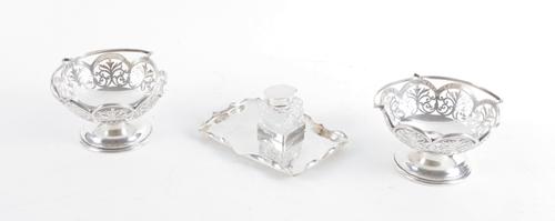 A PAIR OF SILVER BONBON BASKETS AND A SILVER INKSTAND (3)