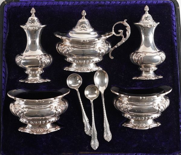 A SILVER FIVE PIECE CONDIMENT SET