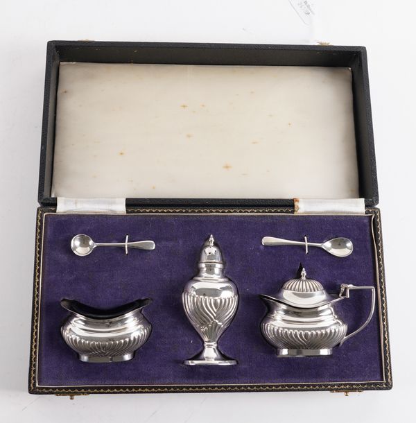 A SILVER THREE PIECE CONDIMENT SET