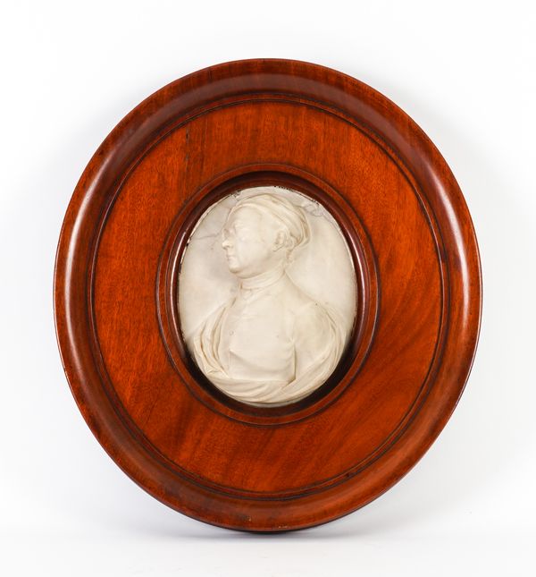 AN ENGLISH MARBLE RELIEF CARVED PORTRAIT MEDALLION