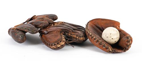 FOUR LEATHER BASEBALL OR SOFT BALL FIELD GLOVES (5)
