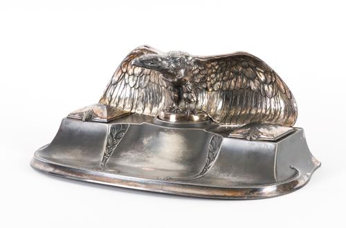 A SILVER PLATED EAGLE MOUNTED INKWELL