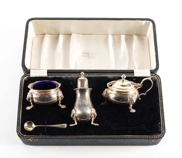 A SILVER THREE PIECE CONDIMENT SET