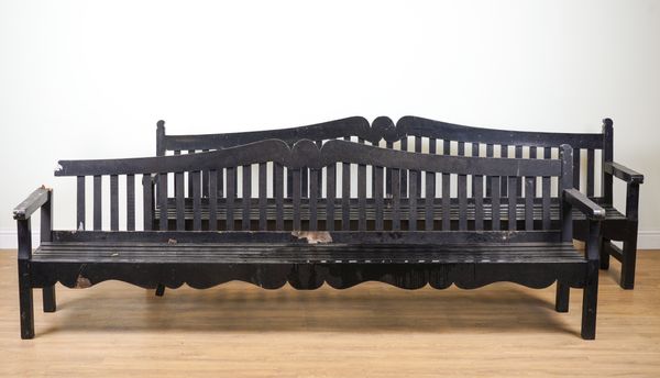 A LARGE BLACK PAINTED SLATTED HARDWOOD GARDEN BENCH (2)