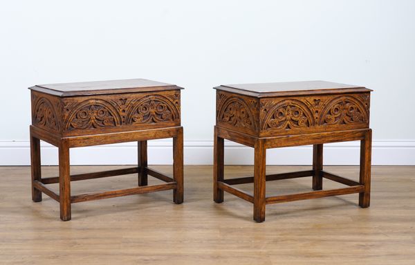 A PAIR OF 17TH CENTURY STYLE CARVED OAK LIFT TOP BIBLE BOXES ON STANDS (2)