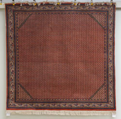 AN INDIAN RUG OF PERSIAN SARABAND DESIGN