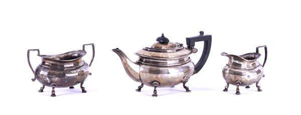 A SILVER THREE PIECE TEA SET