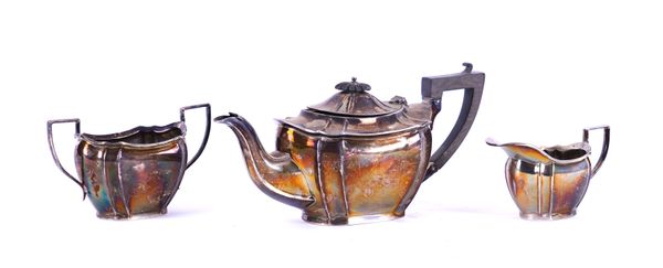 A SILVER THREE PIECE TEA SET