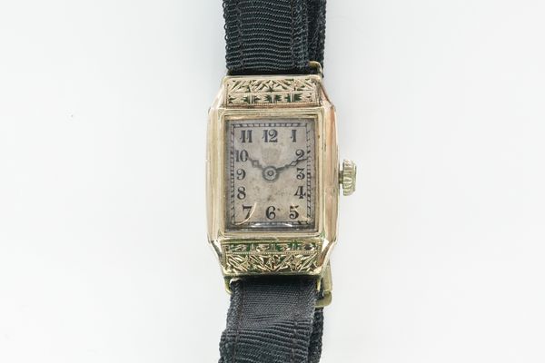 A TAVANNES RECTANGULAR WHITE GOLD PLATED CASED LADY'S WRISTWATCH