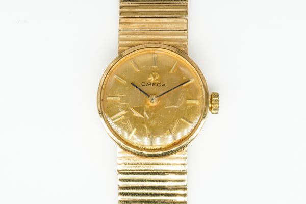 AN OMEGA 9CT GOLD LADY'S BRACELET WRISTWATCH