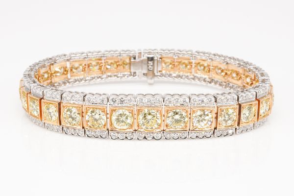 A FANCY YELLOW AND WHITE DIAMOND BRACELET