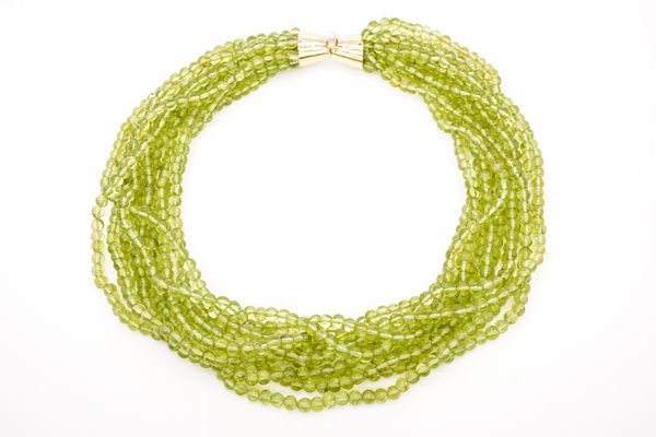 A PERIDOT NECKLACE WITH 18CT CLASP