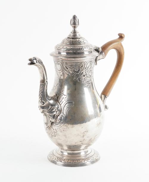 A GEORGE II NEWCASTLE SILVER CHOCOLATE POT