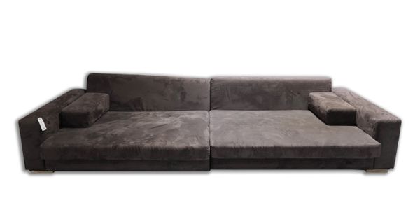 A BROWN SUEDE UPHOLSTERED FOUR SEAT SOFA