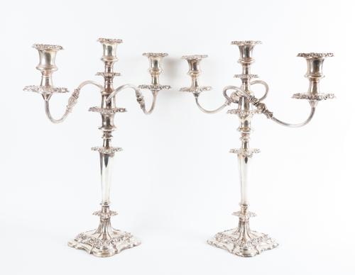 A PAIR OF PLATED THREE LIGHT TABLE CANDELABRA