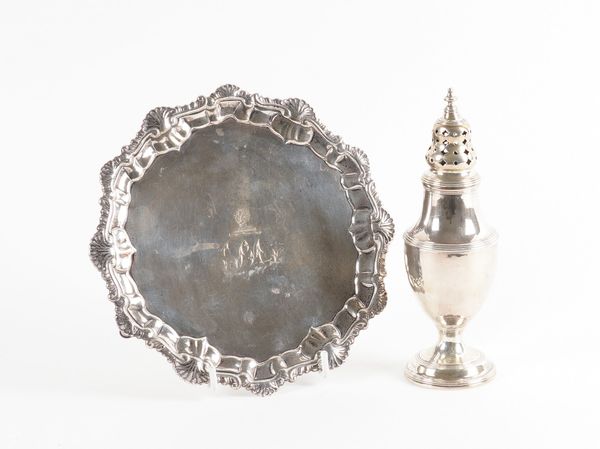 A GEORGE III SILVER WAITER AND A GEORGE III SILVER SUGAR CASTER (2)