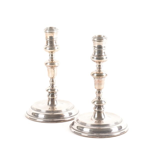 A PAIR OF SILVER TABLE CANDLESTICKS