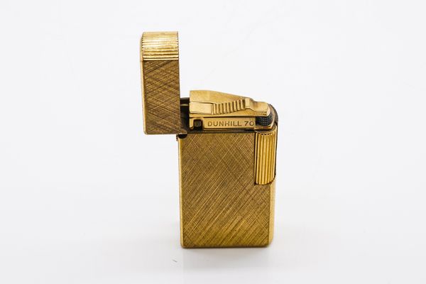 A DUNHILL 70 GILT METAL RECTANGULAR GAS LIGHTER