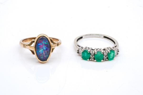 AN EMERALD AND DIAMOND RING AND AN OPAL RING (2)