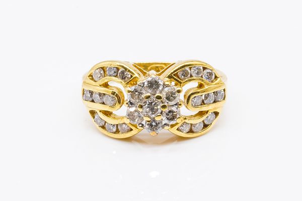 AN 18CT GOLD AND DIAMOND RING