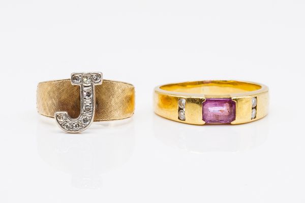 TWO GOLD AND GEM SET RINGS (2)