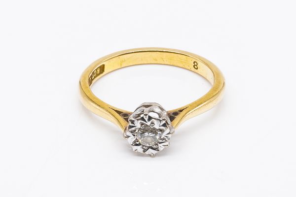 A GOLD AND DIAMOND SINGLE STONE RING