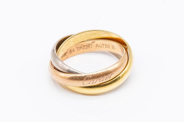 A CARTIER THREE COLOUR GOLD TRIPLE BAND RUSSIAN STYLE WEDDING RING