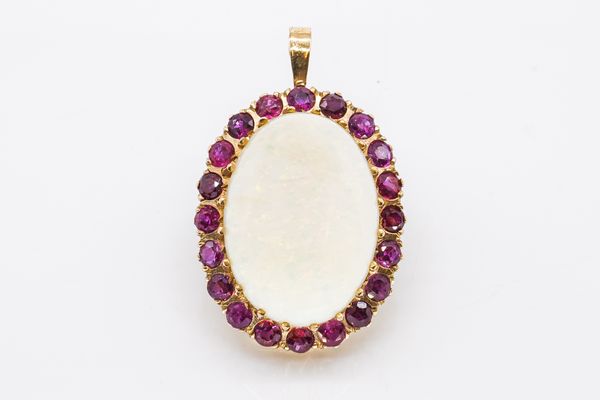 A 9CT GOLD, OPAL AND RUBY PENDANT