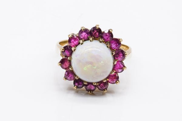 A 9CT GOLD, OPAL AND RUBY CLUSTER RING