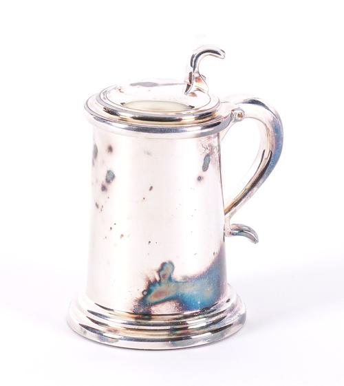 DUNHILL: A SILVER-PLATED LIGHTER IN THE FORM OF A TANKARD